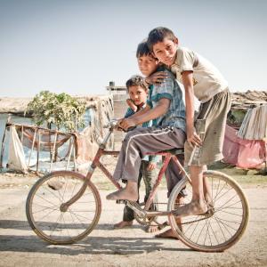 Three Boys on a Bike