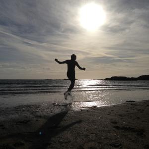 Skim Boarding at sunset