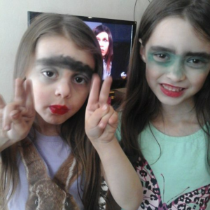Girls putting on makeup 