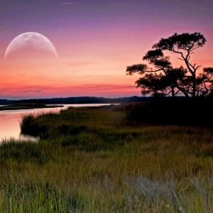Sunset over Assawoman Bay as the moon rises.