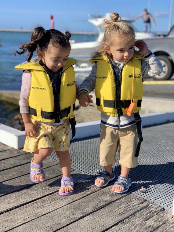 Twins first time on Daddy’s boat 