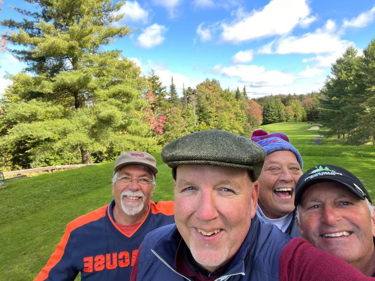 Phi Sigs golfing in Old Forge 