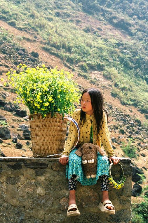 A girl with flowers in Ha Giang